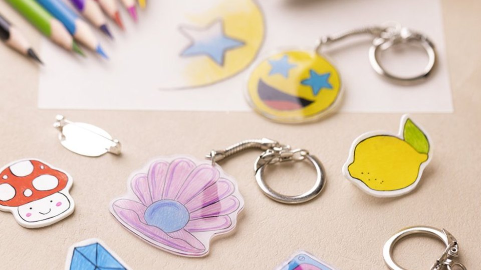 Colourful shrink-art keychain charms made by participants